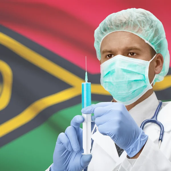 Médecin avec une seringue dans les mains et la série des drapeaux - Vanuatu — Photo