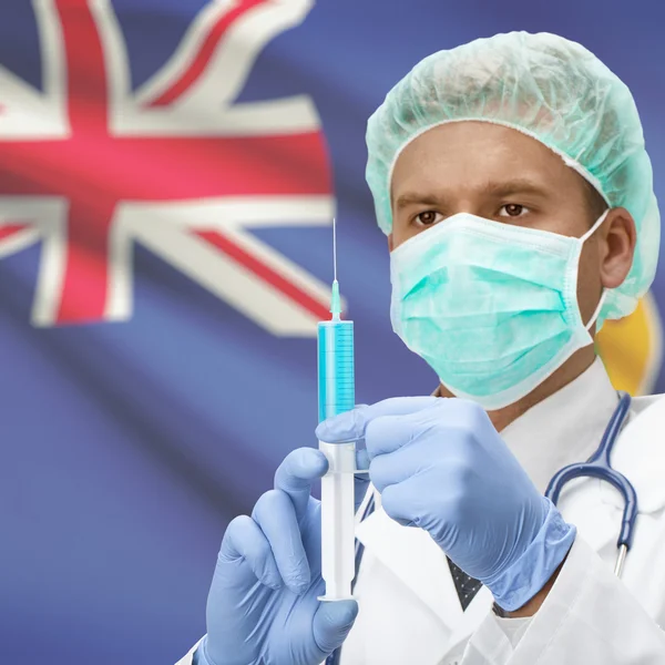 Médico con jeringa en las manos y de la serie bandera - Islas Turcas y Caicos —  Fotos de Stock
