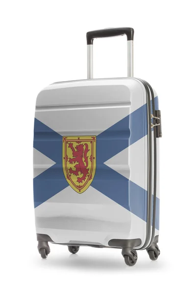 与加拿大领土或省旗系列-新斯科舍省的手提箱 — 图库照片