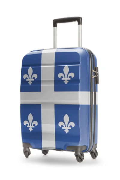 Suitcase with Canadian territory or province flag series - Quebec — Stock Photo, Image