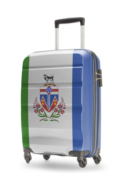 Suitcase with Canadian territory or province flag series - Yukon — Stock Photo, Image