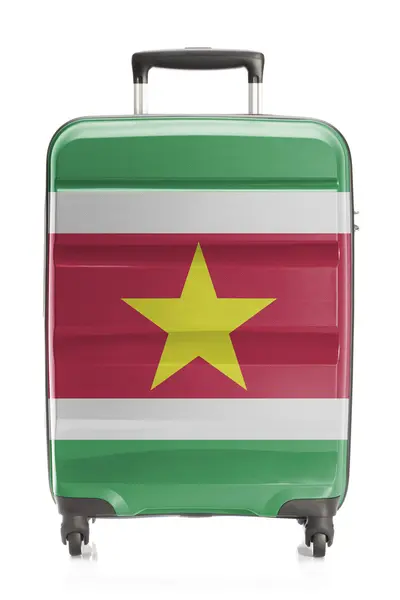 Koffer met nationale vlag serie - Suriname — Stockfoto