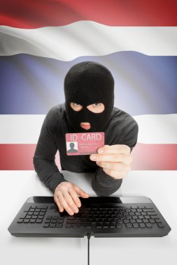 Arka planda bayrağı olan bir hackerın elinde kimlik kartı var - Tayland