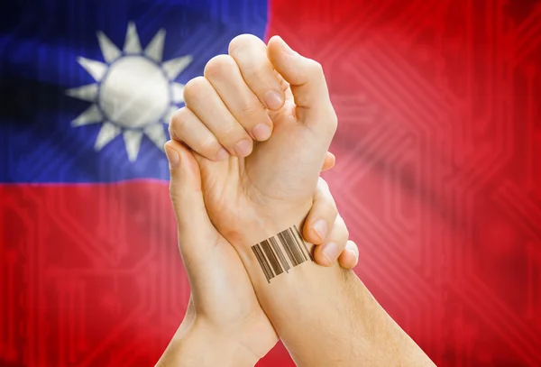 Barcode ID number on wrist and national flag on background - Taiwan — Foto Stock