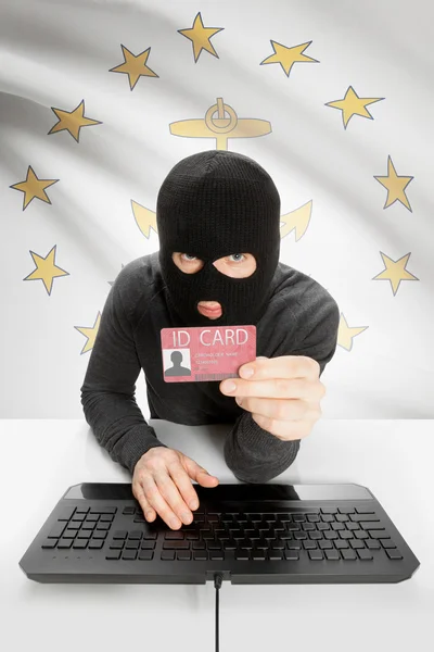 Hacker with USA states flag on background and ID card in hand - Rhode Island — Stockfoto