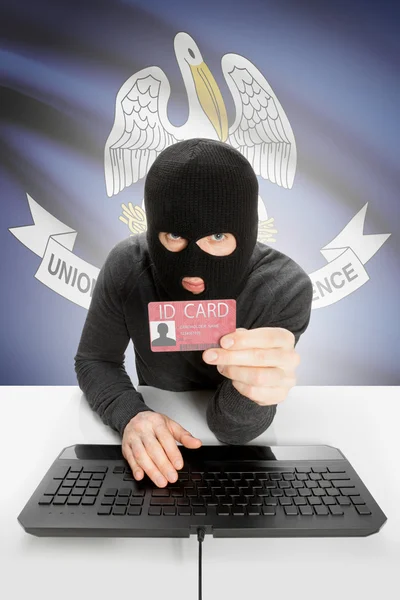 Hacker with USA states flag on background and ID card in hand - Louisiana — Stock fotografie