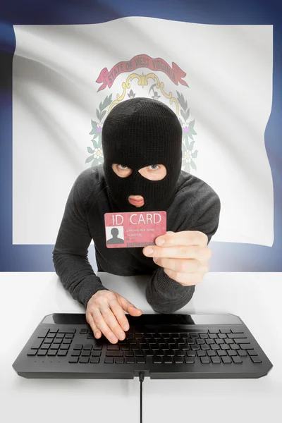 Hacker with USA states flag on background and ID card in hand - West Virginia — Stock Photo, Image