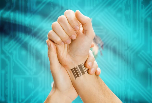 Barcode ID number on wrist and USA states flags on background - Oklahoma — Stock Photo, Image