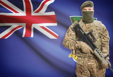 Soldier holding machine gun with flag on background series - British Virgin Islands