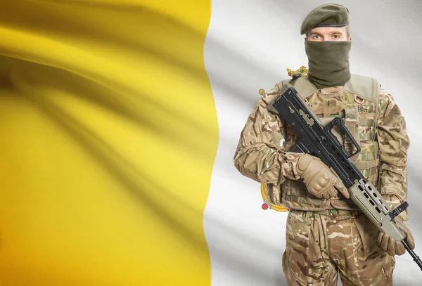 Soldier holding machine gun with flag on background series - Vatican City State — Stok Foto