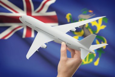 Uçağın içinde el ile arka plan - Pitcairn Adaları bayrağı