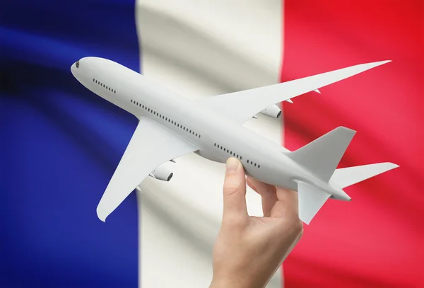 背景 - フランスの旗を手に飛行機 — ストック写真