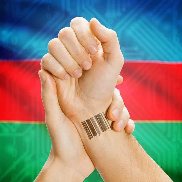 Barcode ID number on wrist and national flag on background series - Azerbaijan — Stock Photo, Image