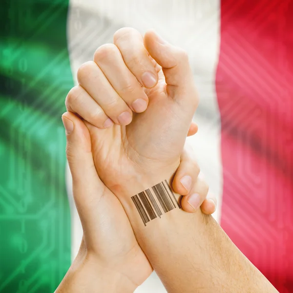 Barcode ID number on wrist and national flag on background series - Italy — Stok fotoğraf