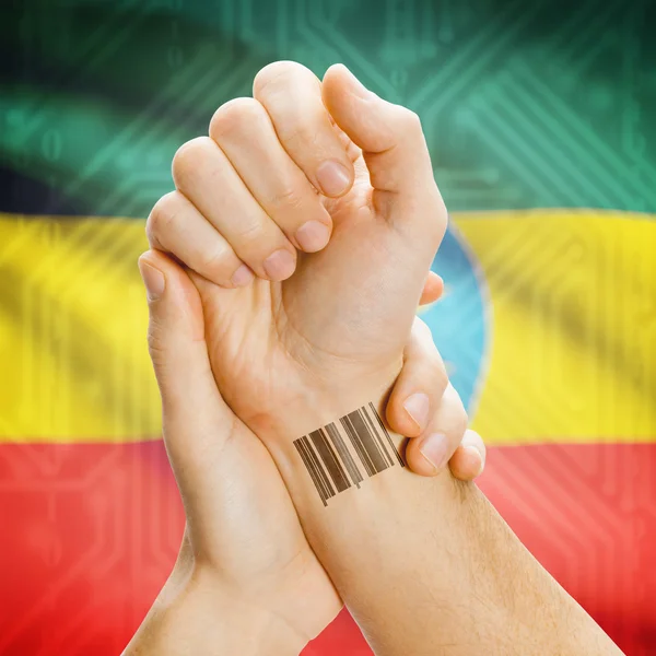 Numéro Barcode Id sur le poignet et le drapeau national sur les séries de fond - Ethiopie — Photo