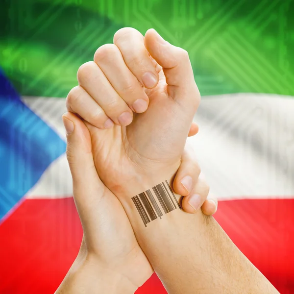 Barcode ID number on wrist and national flag on background series - Equatorial Guinea — 图库照片