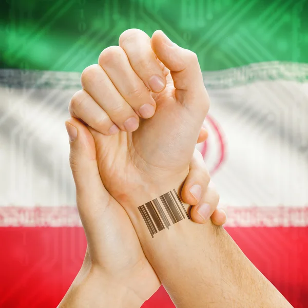 Barcode ID number on wrist and national flag on background series - Iran — Stock Photo, Image