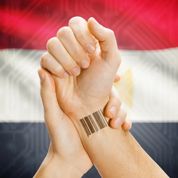 Barcode ID number on wrist and national flag on background series - Egypt — Foto Stock