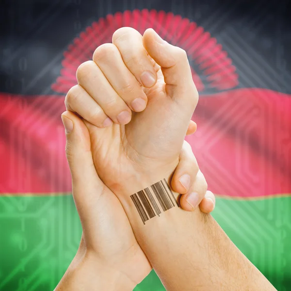 Barcode ID number on wrist and national flag on background series - Malawi — Stock Photo, Image