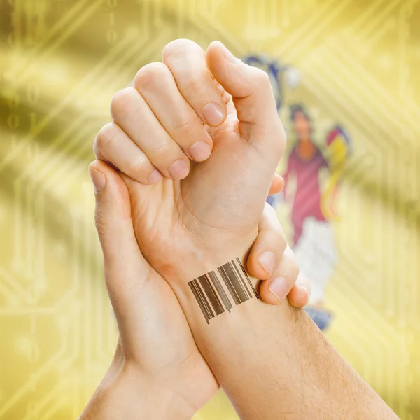 Barcode ID number on wrist and USA states flags on background series - New Jersey — Stock Photo, Image