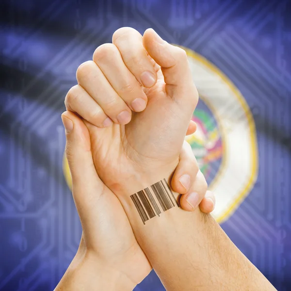 Barcode ID number on wrist and USA states flags on background series - Minnesota — Stok fotoğraf