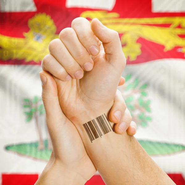 Barcode ID number on wrist with Canadian province flag on background series - Prince Edward Island — 图库照片