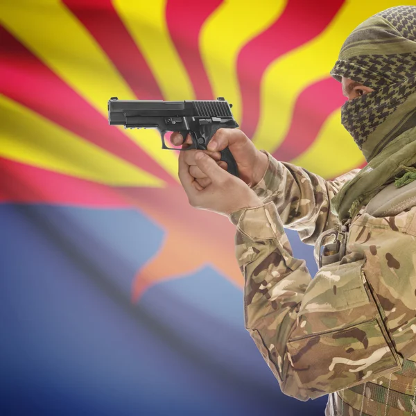 Male with gun in hands and USA state flag on background series - Arizona — стокове фото