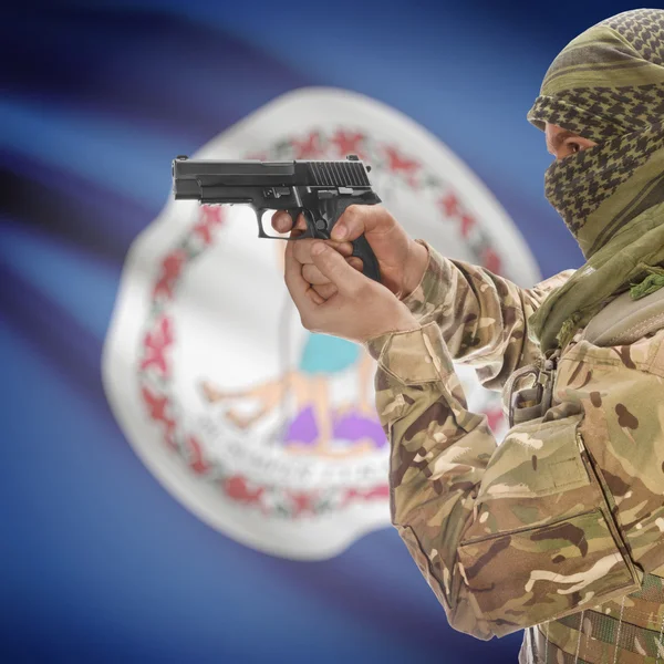 Male with gun in hands and USA state flag on background series - Virginia — стокове фото