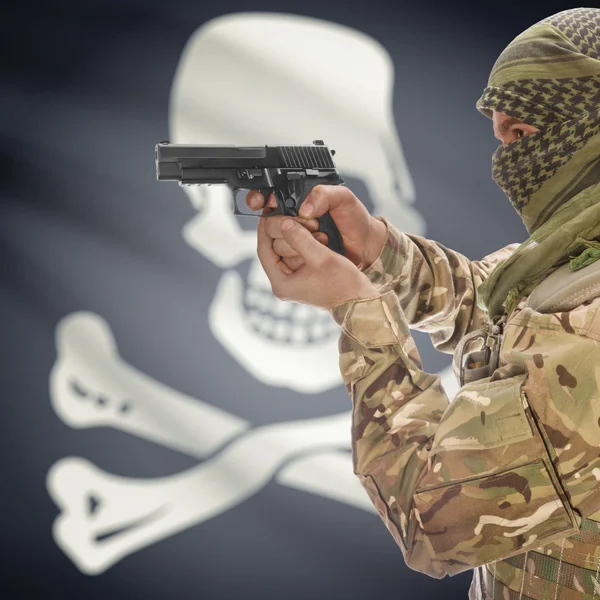 Male with gun in hands and USA state flag on background series - Jolly Roger - symbol of piracy — Stok Foto