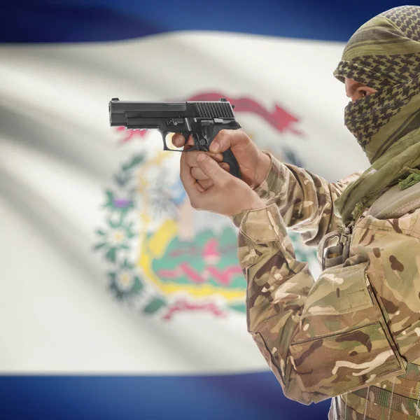 Male with gun in hands and USA state flag on background series - West Virginia — Stok Foto