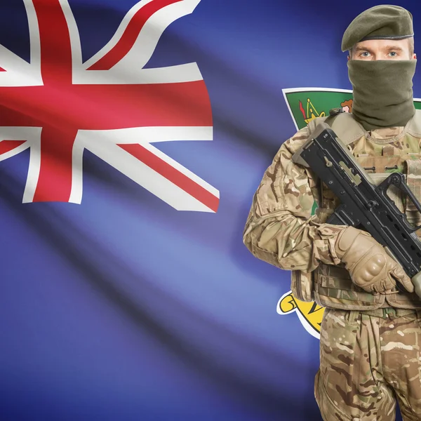 Soldier with machine gun and flag on background - British Virgin Islands — Stok Foto