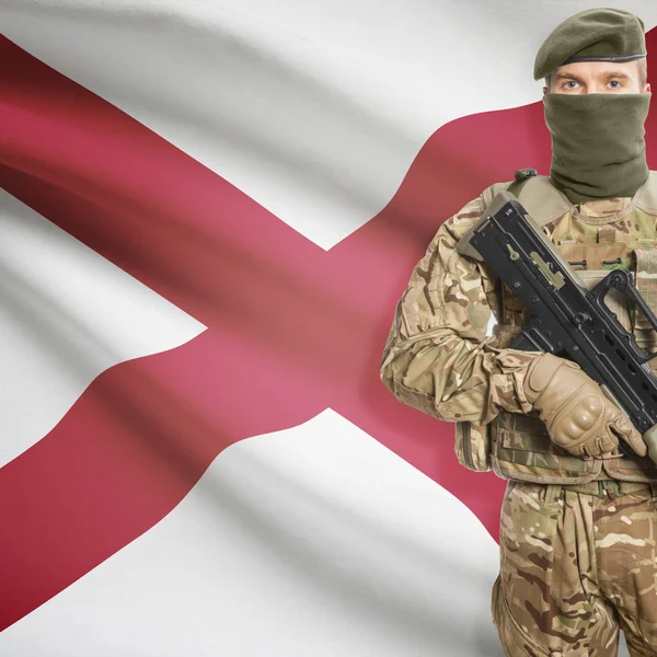 Soldier with machine gun and USA state flag on background - Alabama — Zdjęcie stockowe