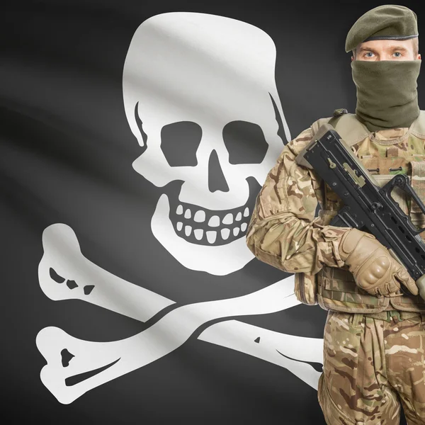 Soldier with machine gun and USA state flag on background - Jolly Roger - Symbol of Piracy — Stok fotoğraf