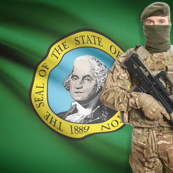 Soldier with machine gun and USA state flag on background - Washington — Foto de Stock