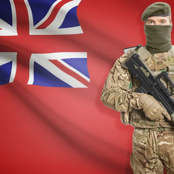 Soldier with machine gun and Canadian province flag on background series - Manitoba — Stock Photo, Image