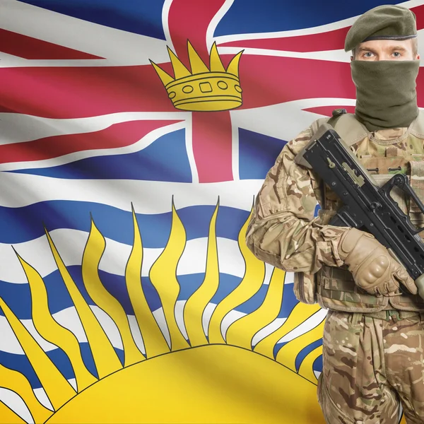 Soldat mit Maschinengewehr und kanadischen Provinz-Flagge auf Hintergrund-Serie - Britisch-Kolumbien — Stockfoto