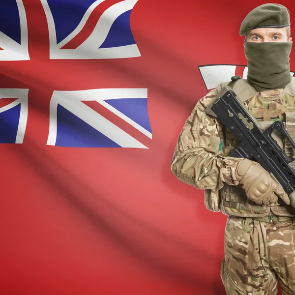 Soldier with machine gun and Canadian province flag on background series - Ontario — Stock Photo, Image