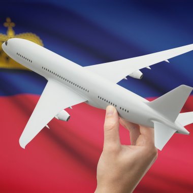Uçak elinde bayrakla işaretle arka plan serisi - Liechtenstein