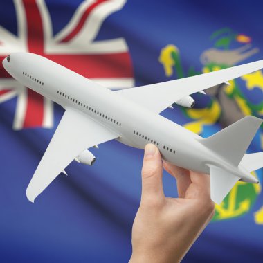 Uçağın içinde el ile arka plan serisi - Pitcairn Adaları bayrağı