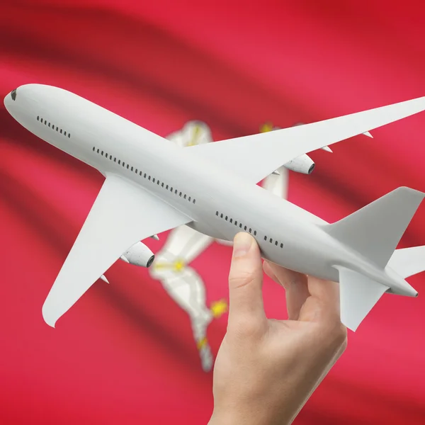 Airplane in hand with flag on background series - Isle of Man — Stock Photo, Image