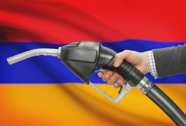 Pompa meme el ile arka plan - Ermenistan Ulusal bayrağını yakıt.