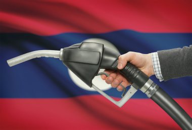 Pompa meme el ile arka plan - Ulusal bayrağını Laos yakıt