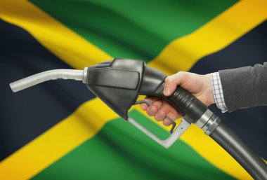 Pompa meme el ile arka plan - Jamaika Ulusal bayrağını yakıt.