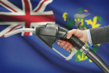 Pompa meme el ile arka plan - Pitcairn Adaları Ulusal bayrağını yakıt.