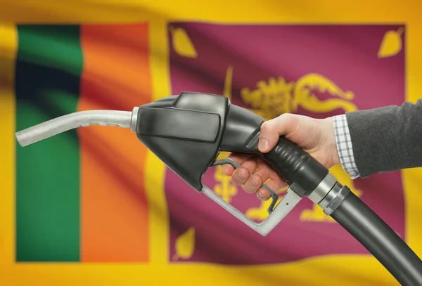 燃油泵嘴牵手与国旗上的背景 — — 斯里兰卡 — 图库照片