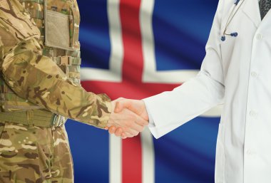 Military man in uniform and doctor shaking hands with national flag on background - Iceland