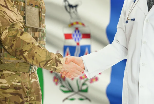 Military man in uniform and doctor shaking hands with Canadian provincies and territories flags on background - Yukon — 图库照片