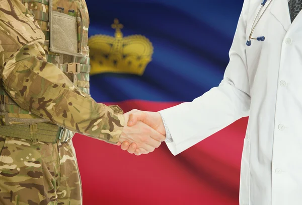 Military man in uniform and doctor shaking hands with national flag on background - Liechtenstein — 图库照片