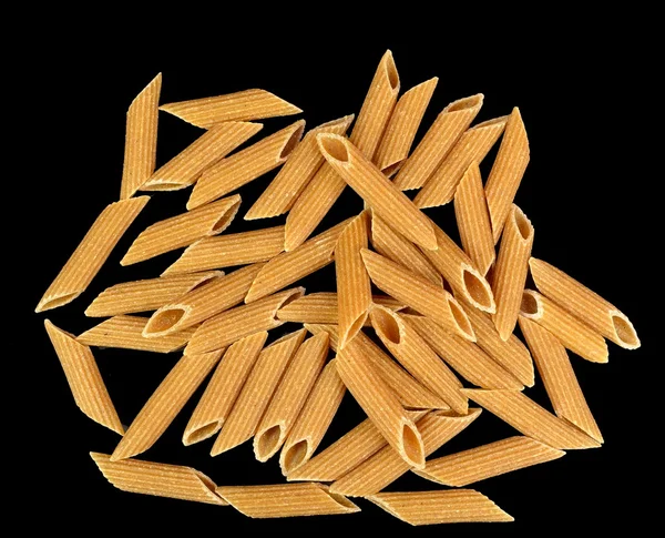 Whole wheat penne rigate pasta — Stock Photo, Image