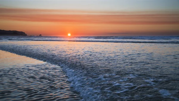 Pôr do sol na costa atlântica — Fotografia de Stock